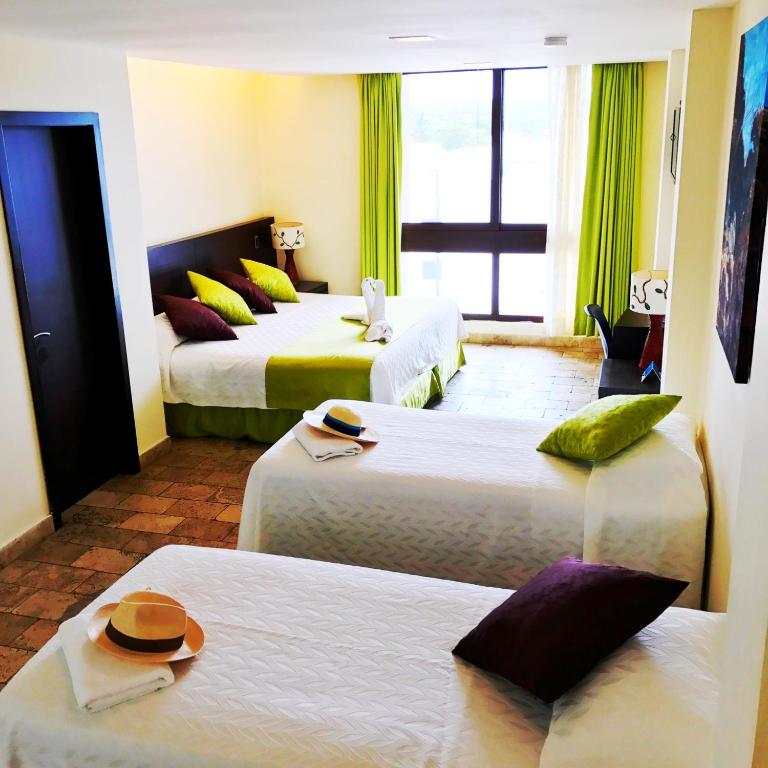 Postel nebo postele na pokoji v ubytování Hotel Isla Sol by Solymar