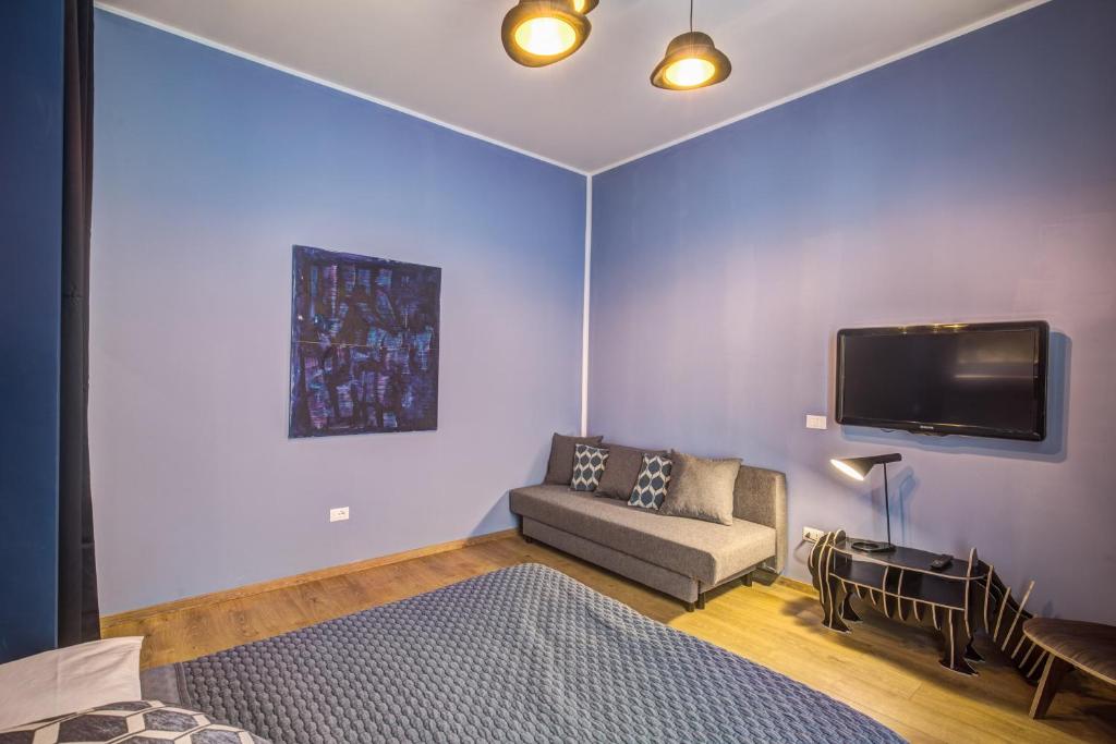 TV a/nebo společenská místnost v ubytování DOWNTOWN SRL - Cinque Terre Stylish