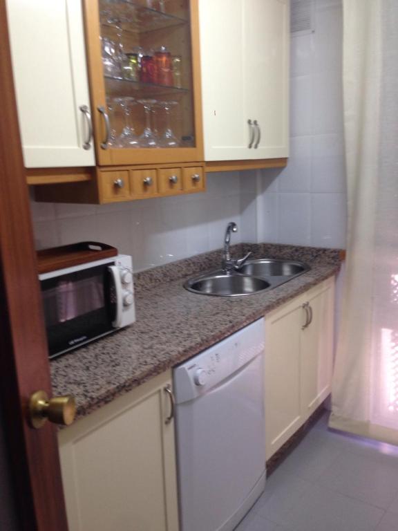 Kuchyň nebo kuchyňský kout v ubytování Casa junto a palacio de VIANA