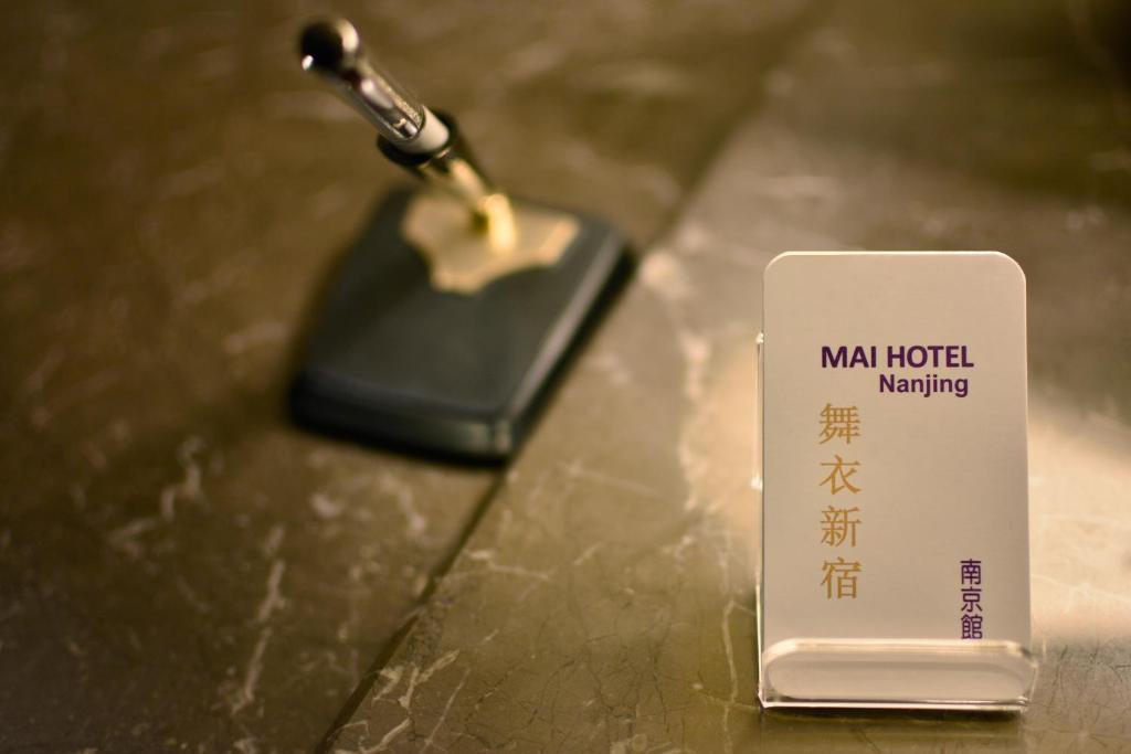 a maan hotel mangling battery sitting on a table at Green World Mai - NanJing in Taipei