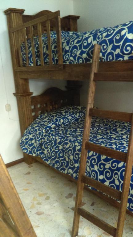 Palanda nebo palandy na pokoji v ubytování Hostal Makea Pachuca