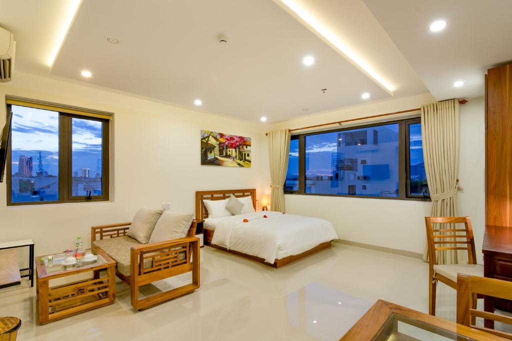 Giường trong phòng chung tại Salamander Apartment hotel