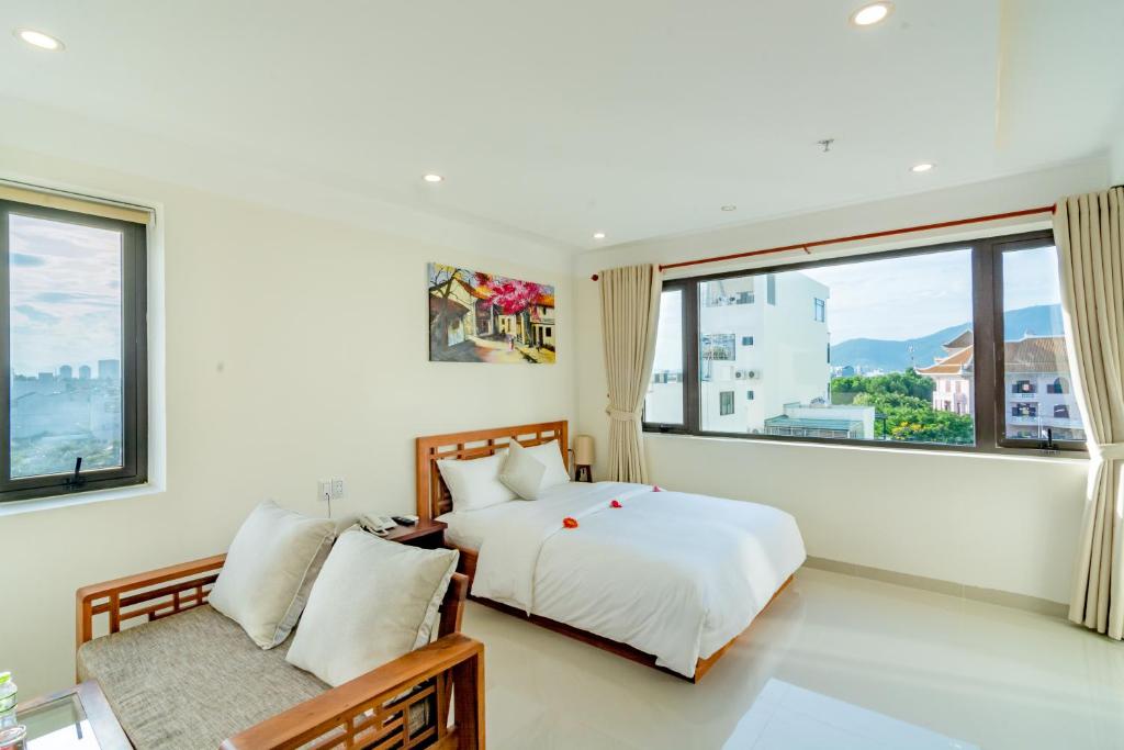 Giường trong phòng chung tại Salamander Apartment hotel