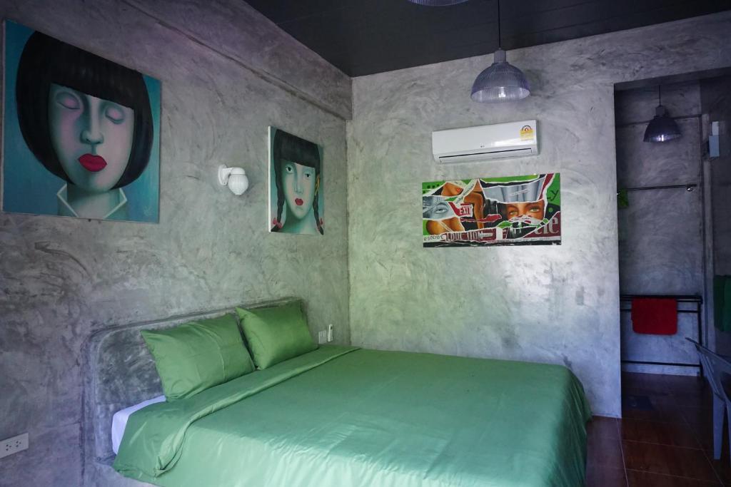 Postel nebo postele na pokoji v ubytování Nadapa Resort