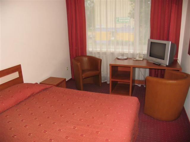 TV a/nebo společenská místnost v ubytování Hotel Ode Self Check-In