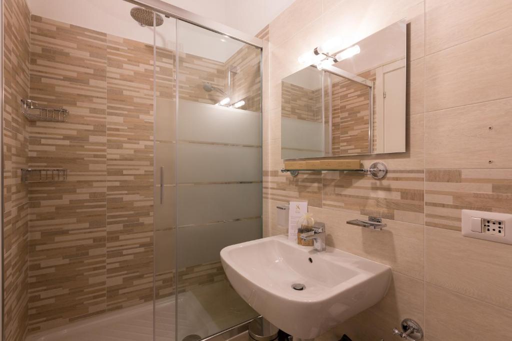 Koupelna v ubytování Ai Suma Hotel