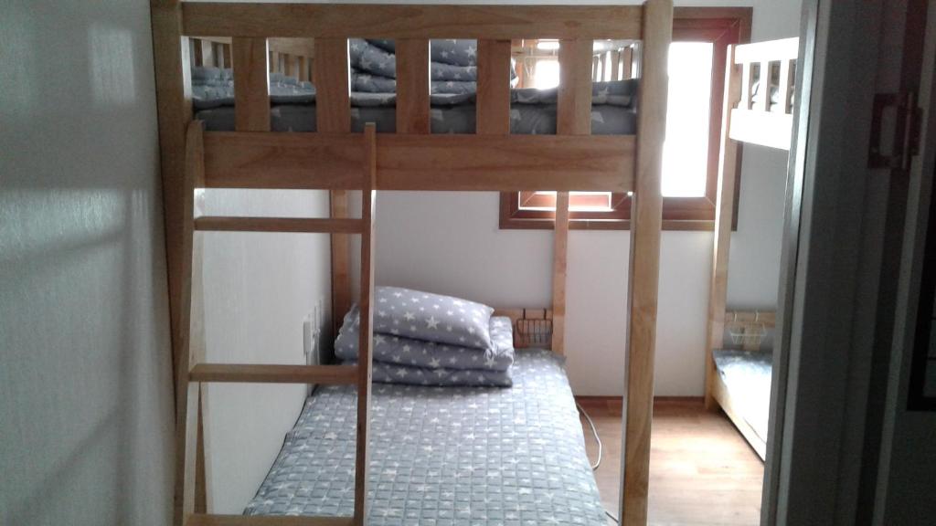 Postel nebo postele na pokoji v ubytování Friends of Loft