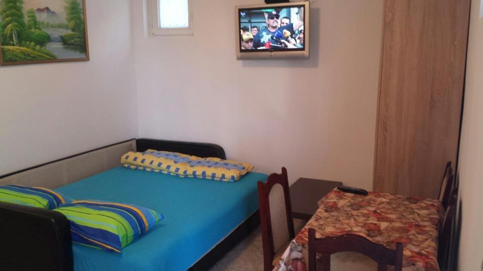 Ένα ή περισσότερα κρεβάτια σε δωμάτιο στο Apartment Tomašević