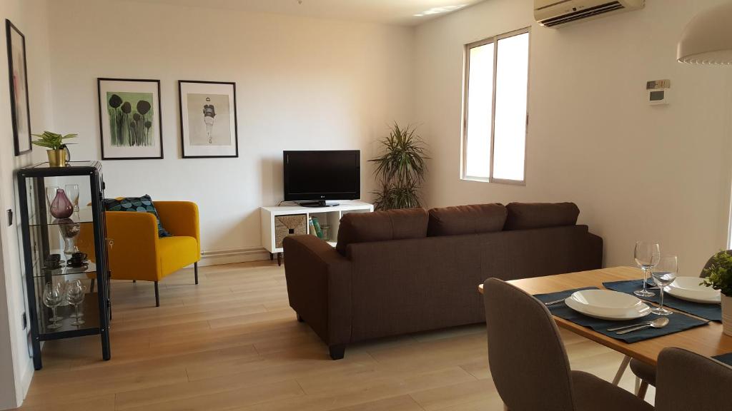 Posezení v ubytování Caputxins Apartment