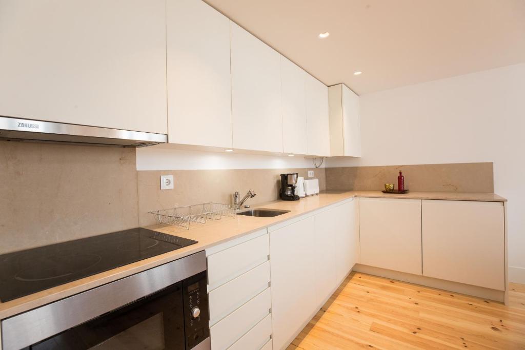 Kuchyň nebo kuchyňský kout v ubytování FLH Santa Catarina Modern Place