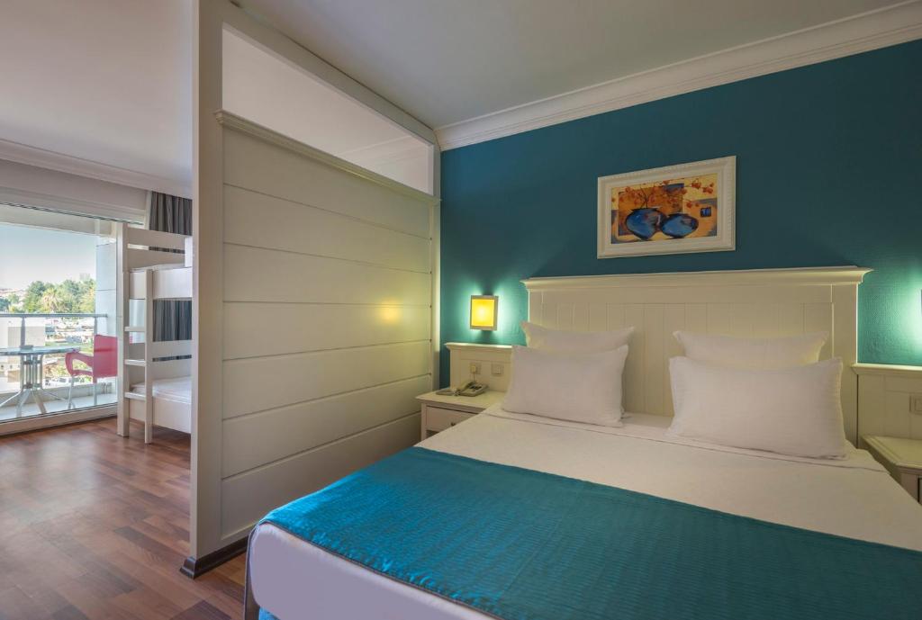 Postel nebo postele na pokoji v ubytování Hotel Terrace Beach Resort All Inclusive