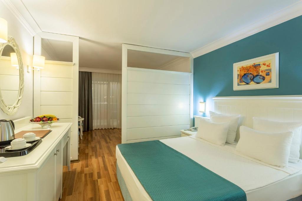 Postel nebo postele na pokoji v ubytování Hotel Terrace Beach Resort All Inclusive