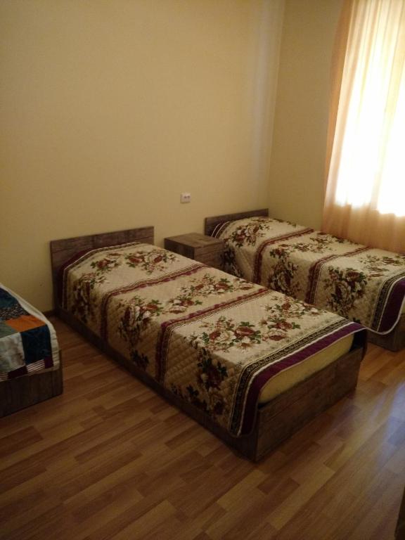 Llit o llits en una habitació de Barbara