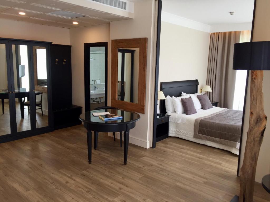 Postel nebo postele na pokoji v ubytování Hotel Touring