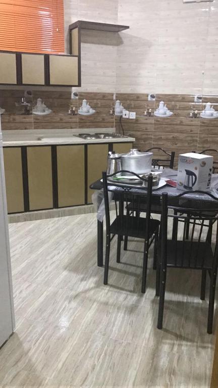 Kuchyň nebo kuchyňský kout v ubytování Rafeef Al Shamal