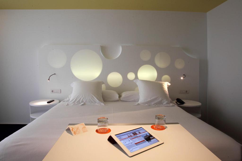 Postel nebo postele na pokoji v ubytování Room Mate Pau, Barcelona