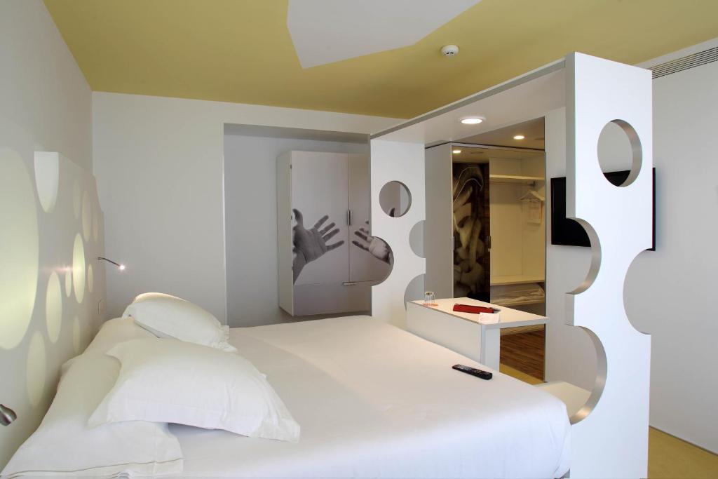 Postel nebo postele na pokoji v ubytování Room Mate Pau, Barcelona