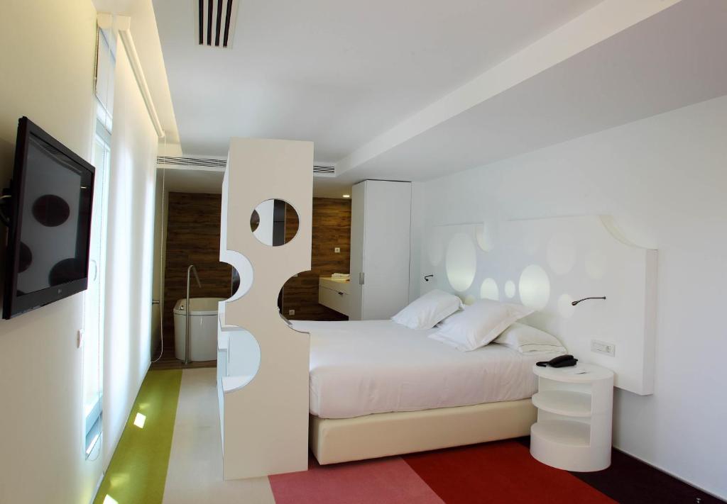Postel nebo postele na pokoji v ubytování Room Mate Pau, Barcelona