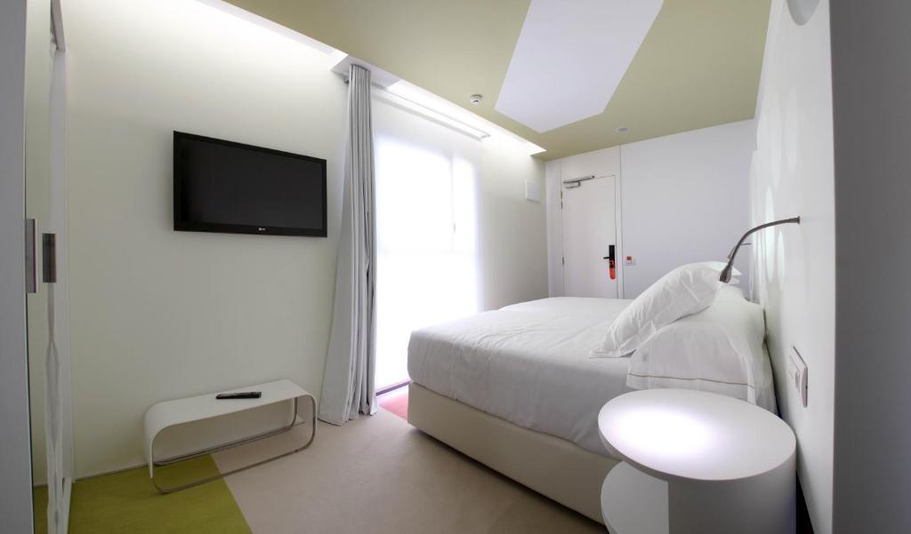 Postel nebo postele na pokoji v ubytování Room Mate Pau, Barcelona