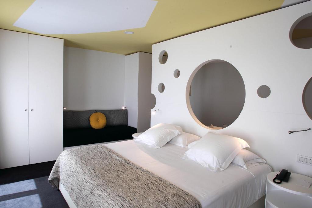 Postel nebo postele na pokoji v ubytování Room Mate Pau, Barcelona