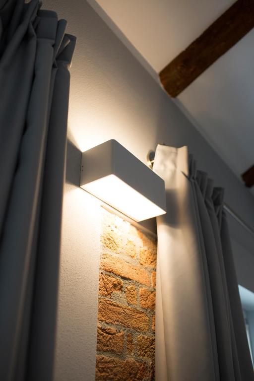 Postel nebo postele na pokoji v ubytování Villa Barbero Alba Langhe