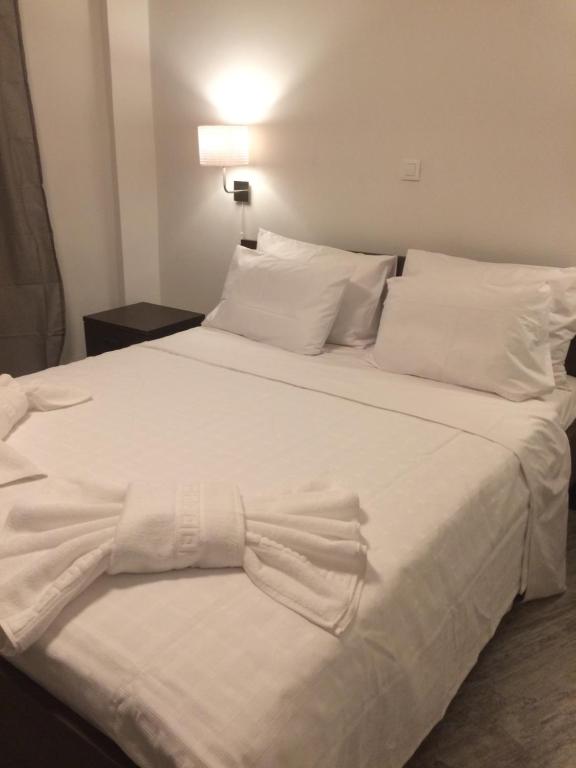 Postel nebo postele na pokoji v ubytování Melita Apartment Seaside