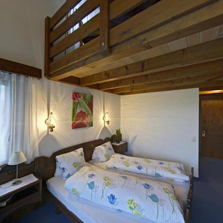 Postel nebo postele na pokoji v ubytování Hotel Bahnhof