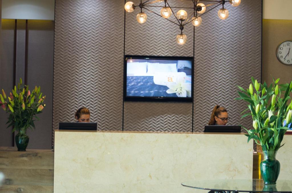 TV a/nebo společenská místnost v ubytování Hotel Expo Abastos