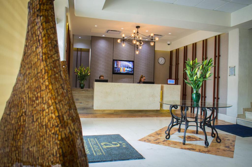 TV a/nebo společenská místnost v ubytování Hotel Expo Abastos