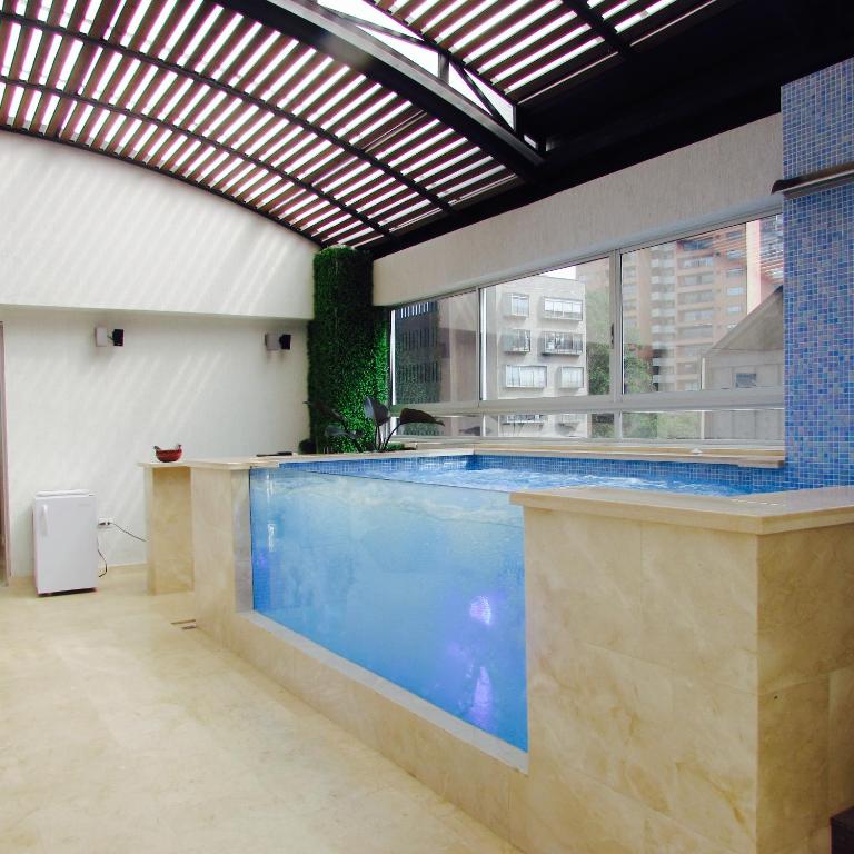 Bazén v ubytování Hotel Madeiro nebo v jeho okolí