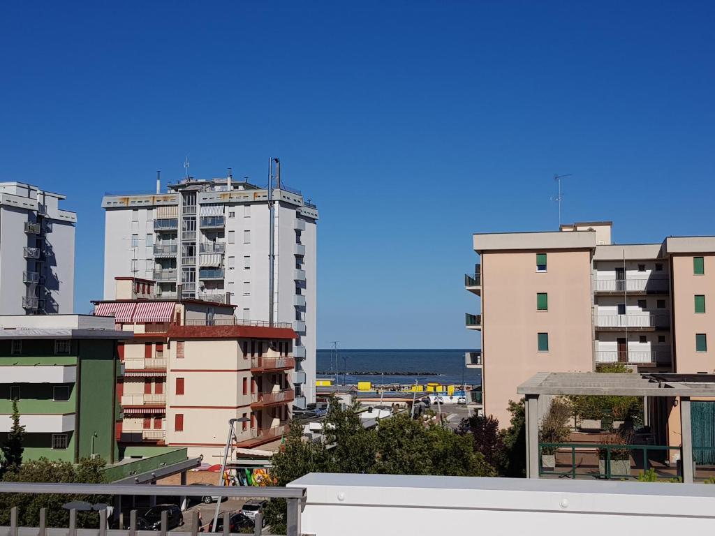 a view of a city with tall buildings at Hotel I Pini in Lido di Pomposa
