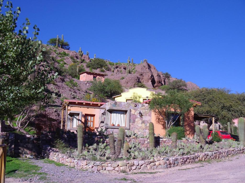 a house on the side of a mountain at Casas de Juella in Tilcara