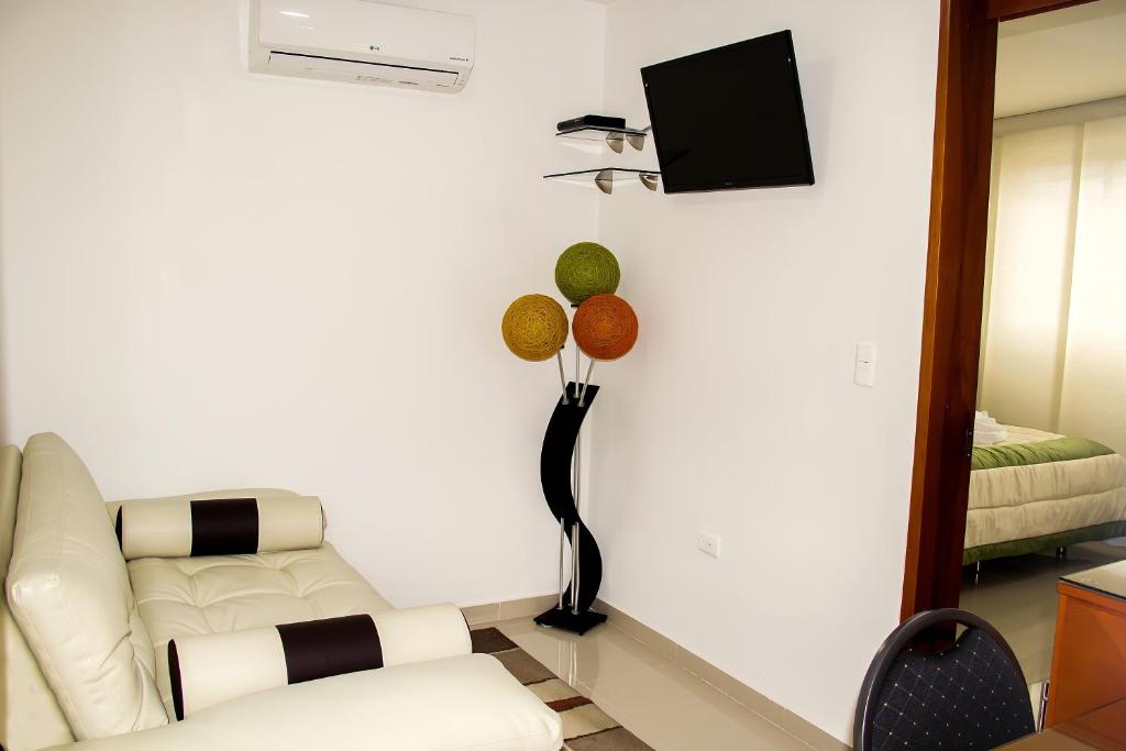 TV a/nebo společenská místnost v ubytování Hotel B`Quin Plaza Cúcuta