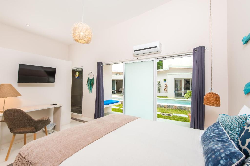 Postel nebo postele na pokoji v ubytování La Ramona Charming Hotel