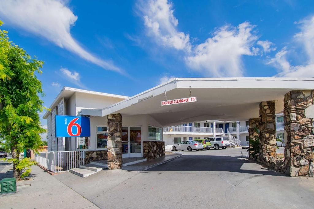a gas station with a sign on the front of it at Motel 6-San Bernardino, CA - Downtown in San Bernardino