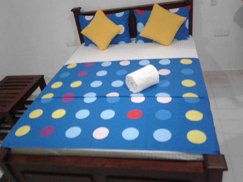 Postel nebo postele na pokoji v ubytování Habarana Dulwan Guest House