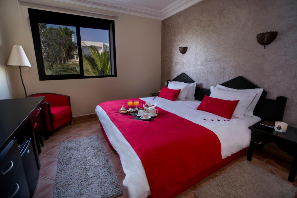 Postel nebo postele na pokoji v ubytování Atlantic Hotel Agadir