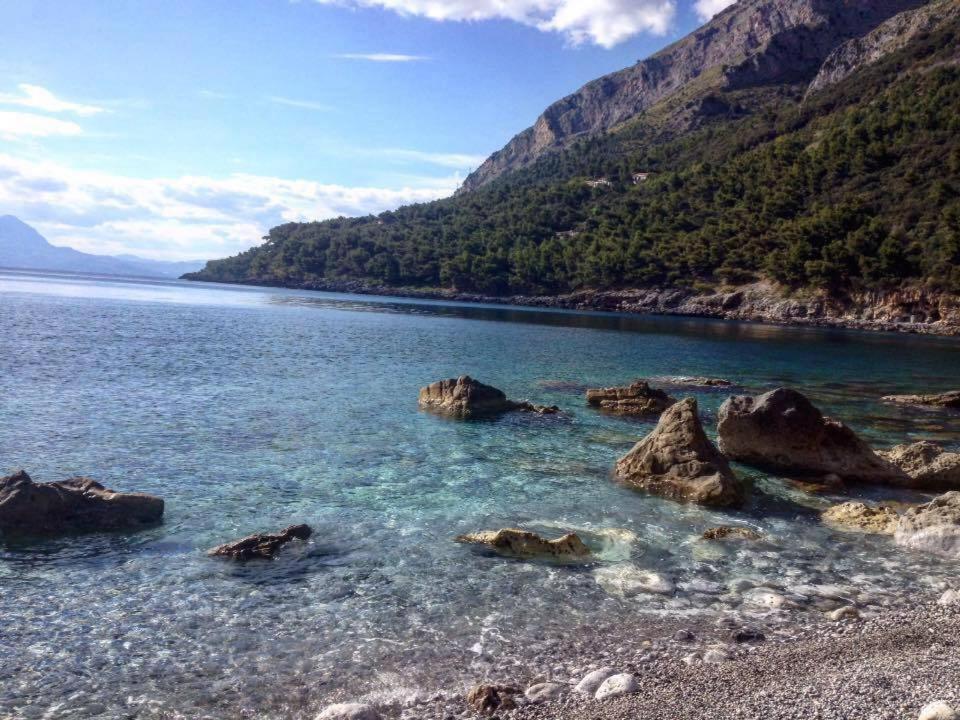 a view of a lake with rocks in the water at B&B HF Fiorella in Maratea