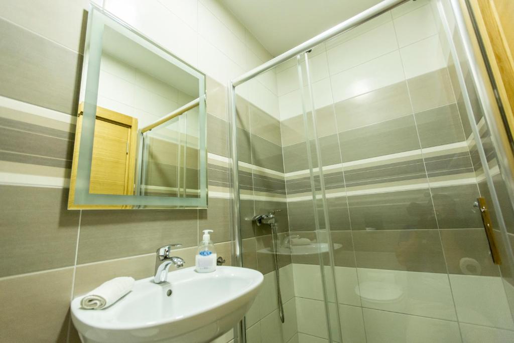 Koupelna v ubytování Apartmani Amaro