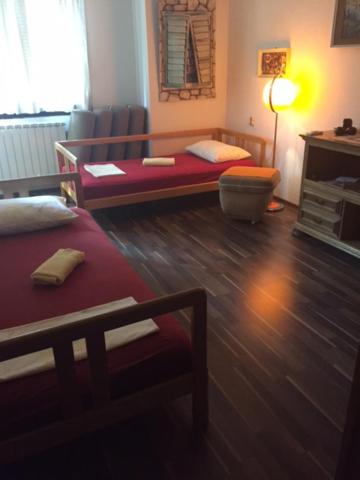 Postel nebo postele na pokoji v ubytování Rooms Ana
