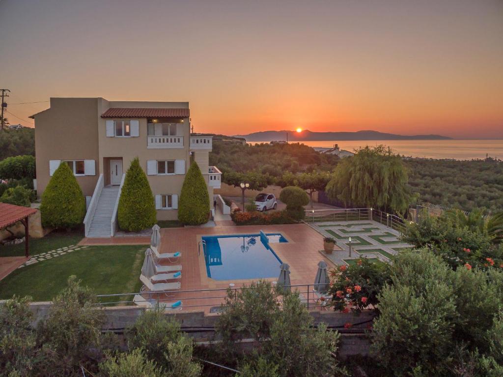 an aerial view of a house with a swimming pool at Villa Aretousa 2 in Agia Marina Nea Kydonias