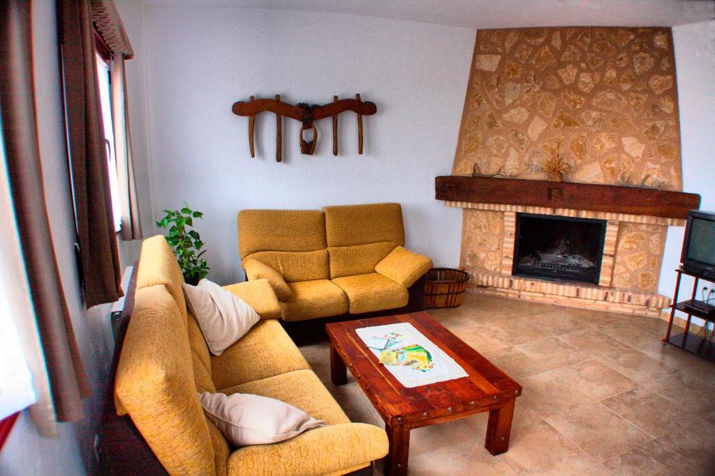 Ein Sitzbereich in der Unterkunft Casa Rural Ca'l Gonzalo