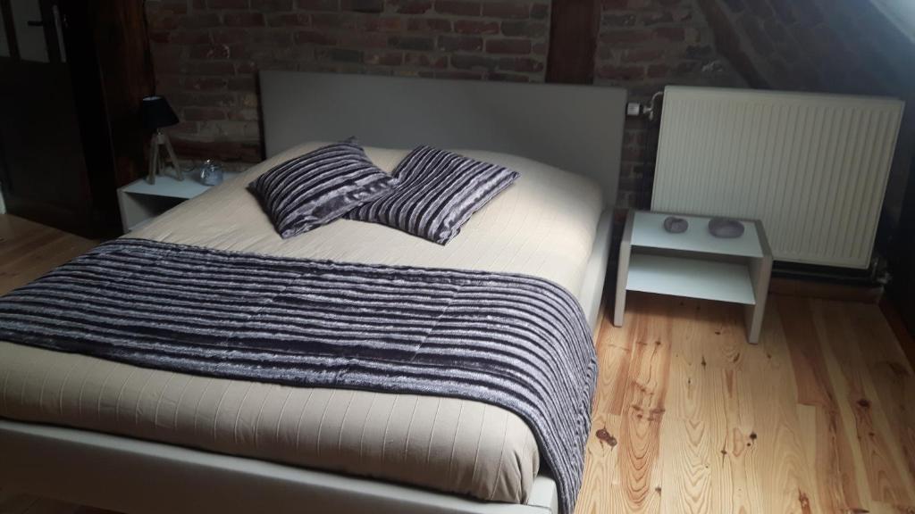Postel nebo postele na pokoji v ubytování La Masure
