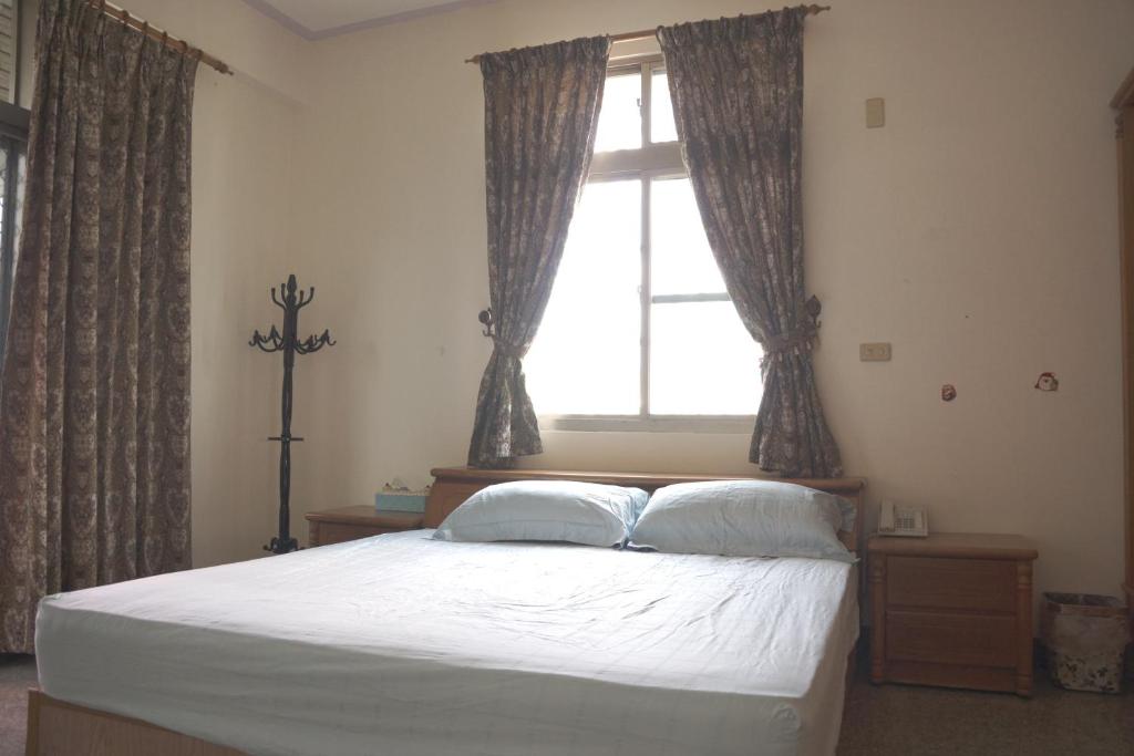 Postel nebo postele na pokoji v ubytování Tong He Ren Jia Homestay