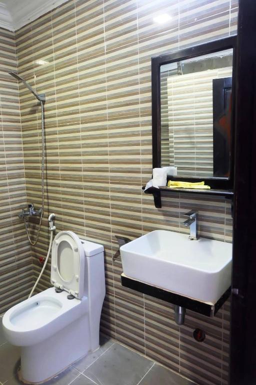 Koupelna v ubytování VIBOLA Guesthouse