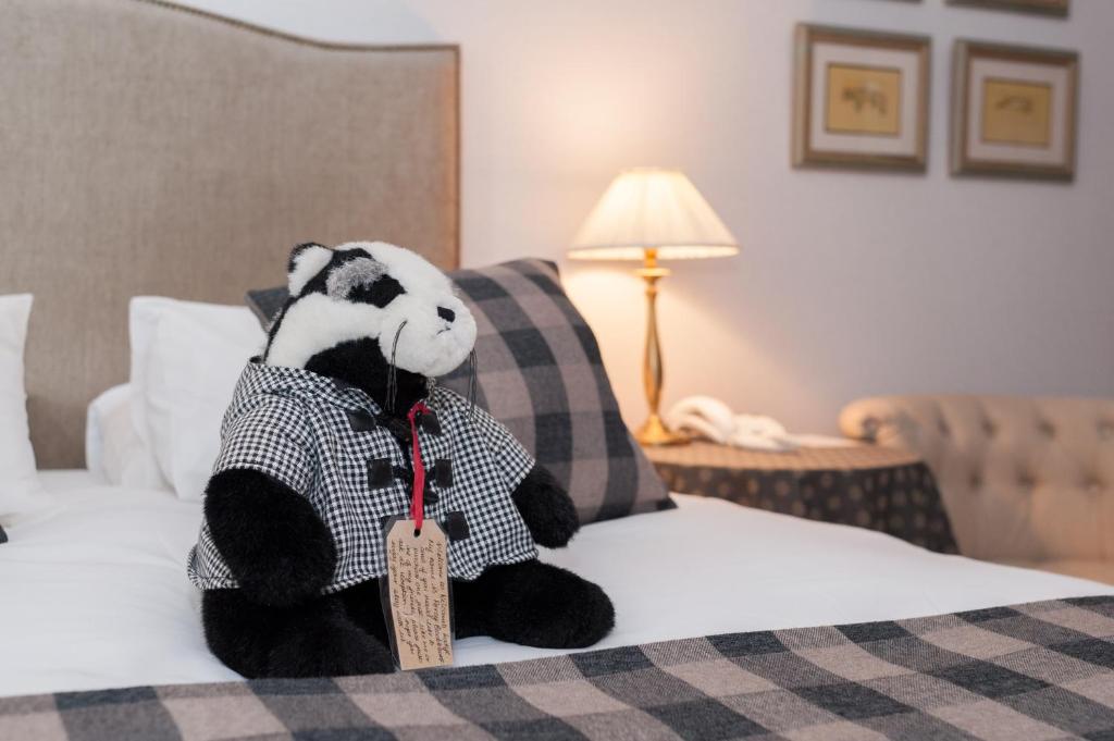Postel nebo postele na pokoji v ubytování Kilcamb Lodge Hotel