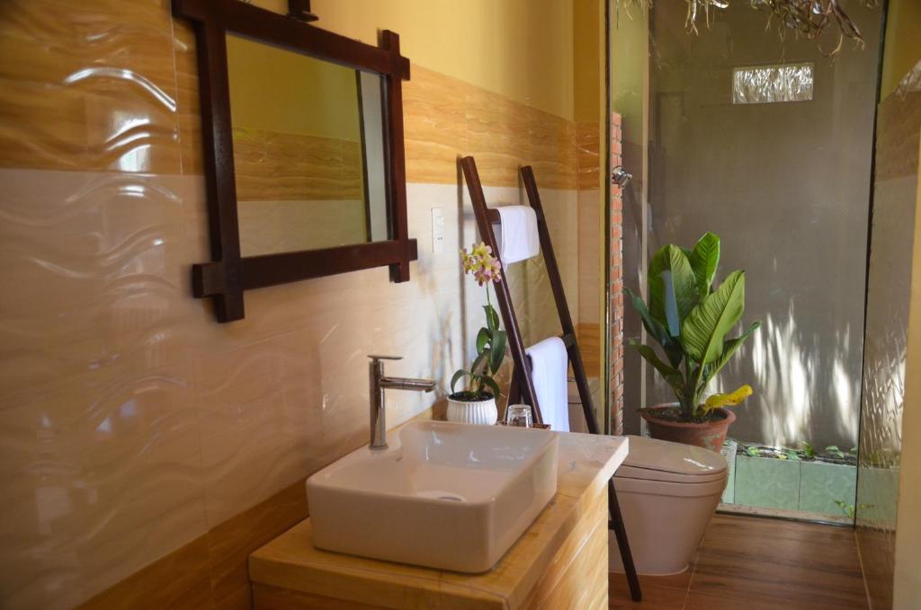Koupelna v ubytování Coco Bungalows Hoi An