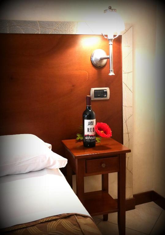 Postel nebo postele na pokoji v ubytování Hotel La Pace - Experience