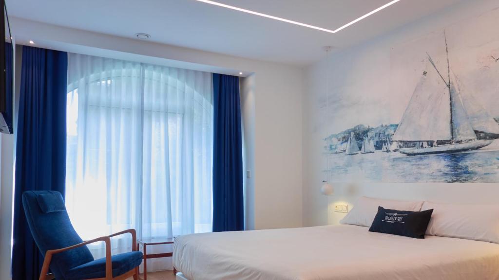 Boulevart Donostia tesisinde bir odada yatak veya yataklar