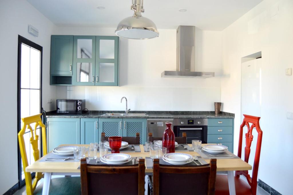A kitchen or kitchenette at Ohana Apartamento Rural